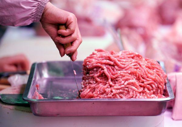 Pork for sale is seen at a market in Beijing on Dec. 26, 2018. (Jason Lee/Reuters)