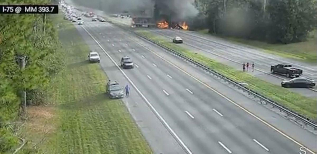 Photos of the incident showed a tractor-trailer engulfed in flames amid the wreckage of other vehicles (CNN)