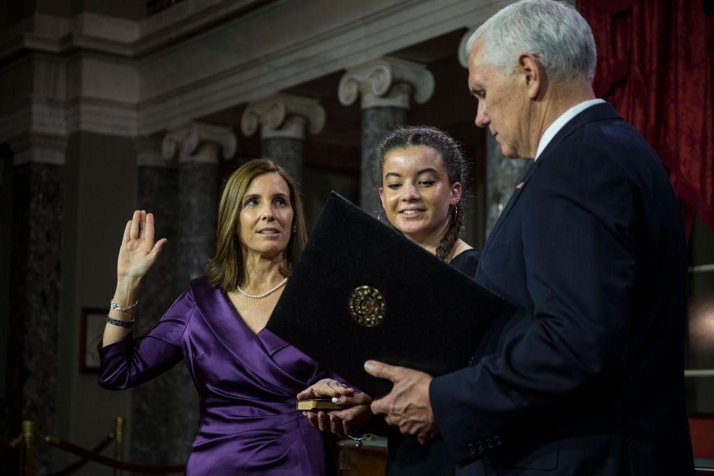 Sen. Martha McSally (R-AZ) participates in a mock swearing-in ceremony with Vice President Mike Pence on Capitol Hill in Washington on Jan. 3, 2019. (Photo by Zach Gibson/Getty Images)