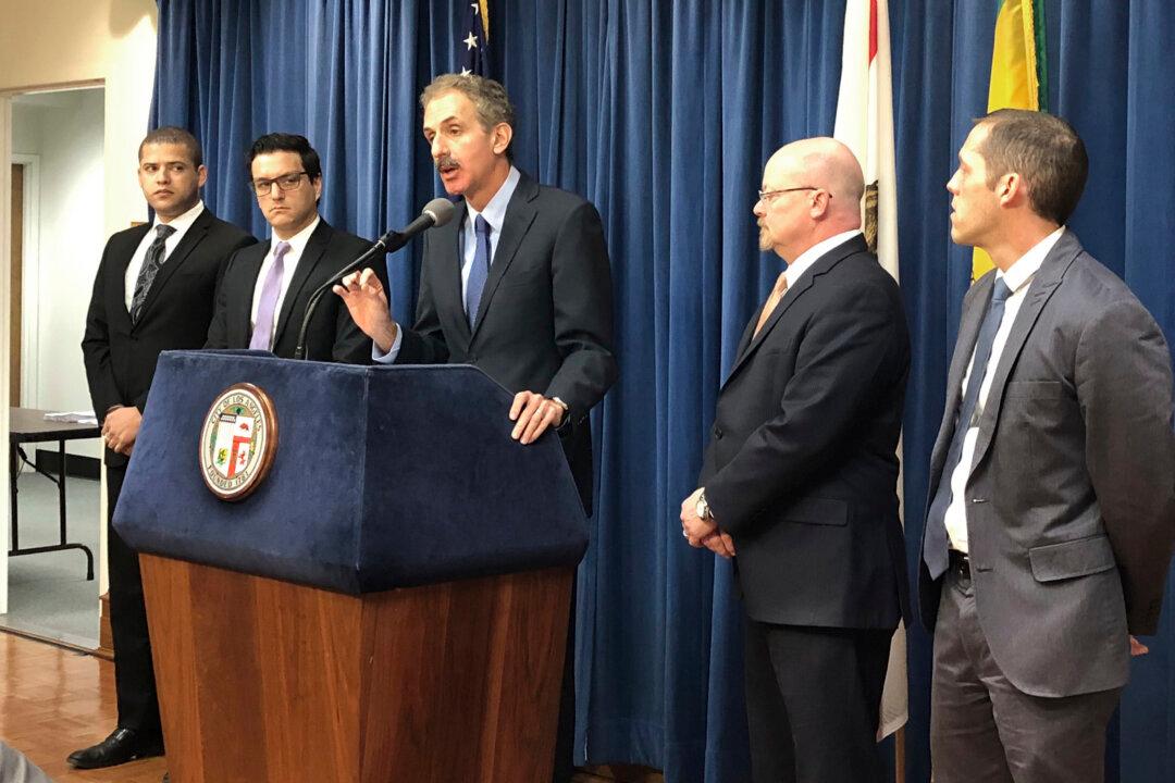 Los Angeles Sues Apartment Owner for Alleged Crime, Gangs at Location