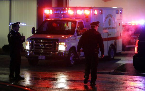 A stock photo shows an ambulance with lights flashing. (Joshua Lott/Getty Images)