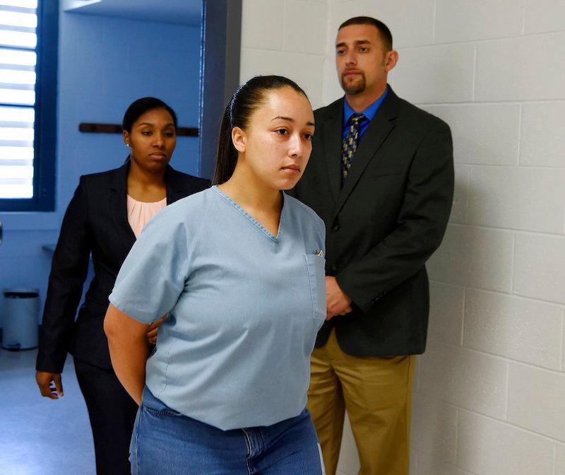 Cyntoia Brown, a woman serving a life sentence for killing a man when she was a 16-year-old prostitute, enters her clemency hearing at Tennessee Prison for Women in Nashville, Tenn on May 23, 2018. (Lacy Atkins /The Tennessean via AP, Pool)