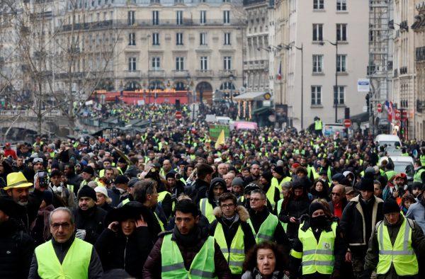Protesters wearing yellow vests take part in a demonstration by the 'yellow vests' movement in Paris on Jan. 5, 2019. (Reuters/Gonzalo Fuentes)