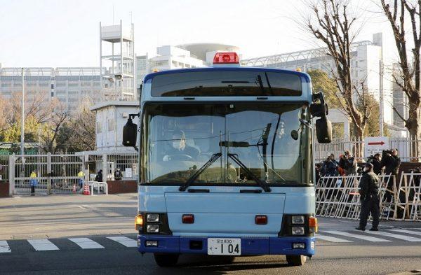 A vehicle presumably carrying former Nissan chairman Carlos Ghosn leaves Tokyo Detention Center in Tokyo, on Jan. 8, 2019. (Eugene Hoshiko/AP Photo)