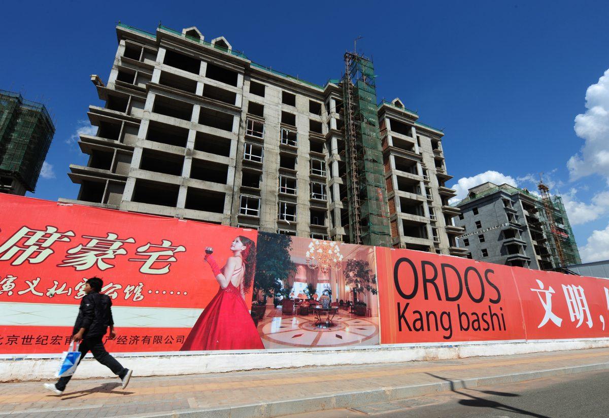 Empty apartment buildings stand in the city of Ordos, Inner Mongolia, on Sept. 12, 2011. (MARK RALSTON/AFP/Getty Images)