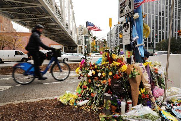 Flowers mark the location where terrorist Sayfullo Saipov crashed into a cyclist along a Manhattan bike path ending a rampage with a truck last Tuesday afternoon on November 7, 2017 in New York City. Eight people were killed and 12 were injured when 29-year-old Saipov intentionally drove a truck onto a bike path. Since the incident security has been heightened throughout the city and new police barriers have been placed along the bike path. (Photo by Spencer Platt/Getty Images)