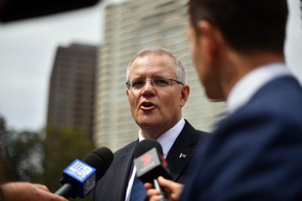 Australia's Prime Minister Scott Morrison speaks to media after the official opening of the refurbished ANZAC Memorial in Sydney on Oct. 20, 2018. (Saeed Khan/AFP/Getty Images)