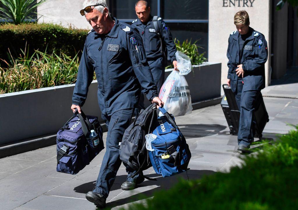 Victoria Police forensic officers remove a bag from the Italian consulate in Melbourne on Jan. 9, 2019. (William West/AFP/Getty Images)