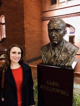 Jennifer Pike with a bust of Karol Szymanowski in Katowice, Poland. (Courtesy of Jennifer Pike)