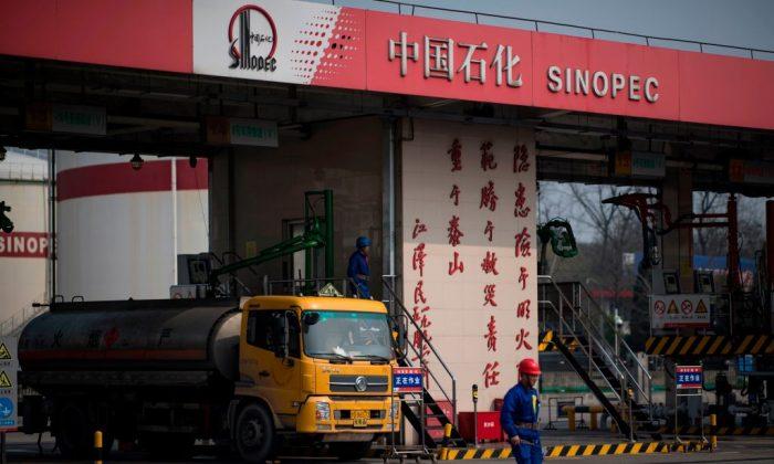 In China, Workers Demand Owed Wages From State-Supported Petrochemical Project