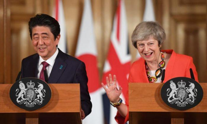 After Meeting UK’s May, Japan’s Abe Says World Does Not Want No-deal Brexit