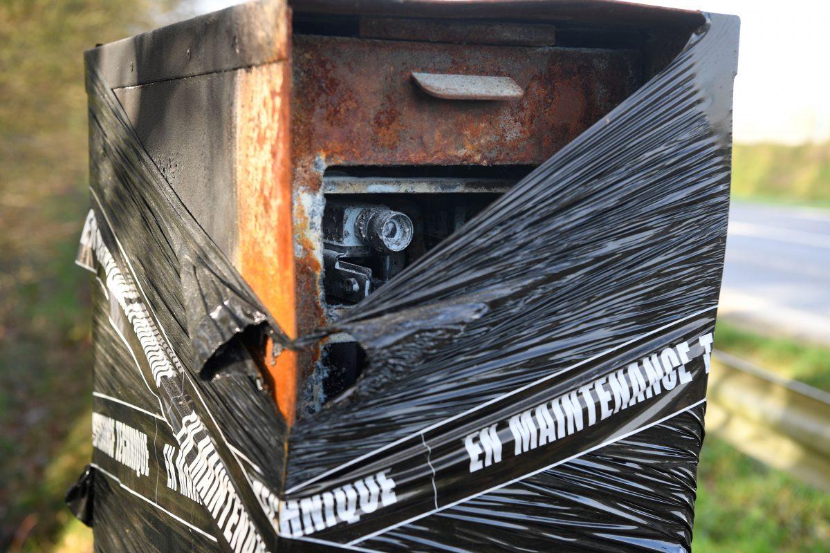 A burned speed camera covered with plastic and tape reading "under technical maintenance" in Noyal-Chatillon-sur-Seiche, western France, on Jan. 10, 2019. (Damien Meyer/AFP/Getty Images)