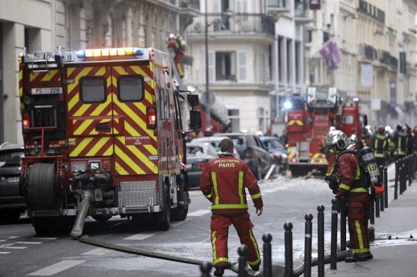 Firefighters work at the scene of a gas leak explosion in Paris, France, on Jan. 12, 2019. (AP Photo/Kamil Zihnioglu)