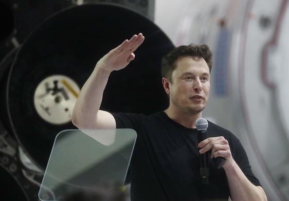 SpaceX CEO Elon Musk speaks at a press conference at SpaceX headquarters where he announced the Japanese billionaire chosen by the company to fly around the moon, on Sept. 17, 2018 in Hawthorne, California. (Mario Tama/Getty Images)