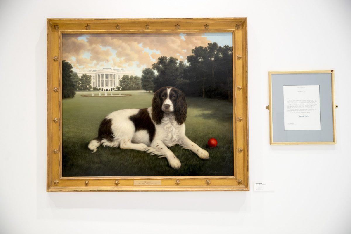 "Millie on the South Lawn" by Christine Merrill, alongside a letter from former first lady Barbara Bush on display at the American Kennel Club Museum of the Dog in N.Y., on Jan. 9, 2019. The museum opens Feb. 8 in midtown Manhattan. (Mary Altaffer/AP)