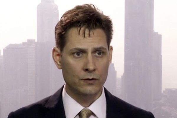 Michael Kovrig, an adviser with the International Crisis Group, a Brussels-based non-governmental organization, speaks during an interview in Hong Kong on March 28, 2018. (AP Photo/File)