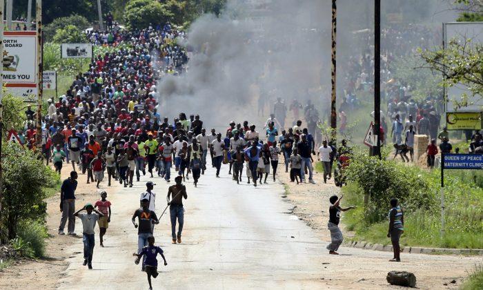 Zimbabwe Army Deploys to Disperse Fuel Protests, 13 Injured