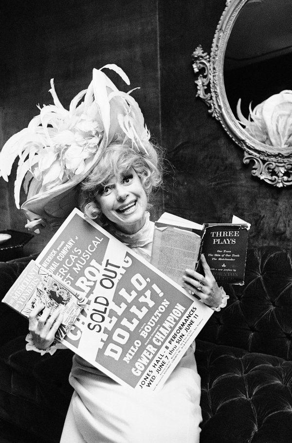 Carol Channing holds a sold-out advertisement poster of "Hello, Dolly" in Houston. Channing, whose career spanned decades on Broadway and on television has died at age 97. (Ed Kolenovsky/AP Photo, File)
