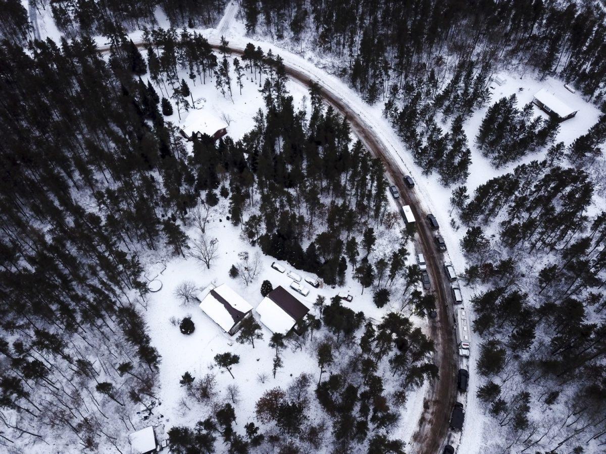 This aerial photo shows the cabin where 13-year-old Jayme Closs was allegedly held by Jake Thomas Patterson, is surrounded by law enforcement vehicles in the town Gordon, Wisconsin on Jan. 12, 2019. (Aaron Lavinsky/Star Tribune via AP)