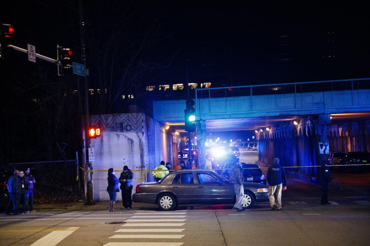 Police investigate the scene where two officers were killed after they were struck by a South Shore train in Chicago on Dec. 17, 2018. (Armando L. Sanchez/Chicago Tribune via AP)