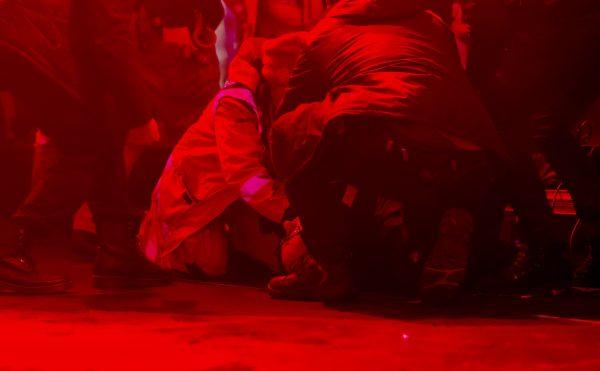 Pawel Adamowicz lies on the floor after being attacked during a charity event in Gdansk, Poland, on Jan. 13, 2019. (Piotr Hukalo/AFP/Getty Images)
