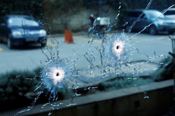 Glass damaged by bullets at the scene where explosions and gunshots were heard at the Dusit hotel compound, in Nairobi, Kenya, on Jan. 15, 2019. (Baz Ratner/Reuters)
