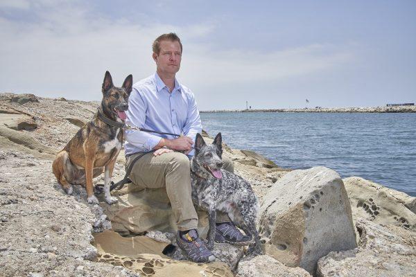 Jeffrey Franklin with two of his dogs. Franklin began training canines professionally 27 years ago. (Courtesy of Joelle Speranza)
