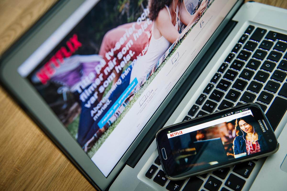 This picture taken on September 11, 2014 shows the on-demand internet streaming media provider, Netflix, on a laptop screen and on a smartphone in Stockholm. (Jonathan Nackstrand/AFP/Getty Images)