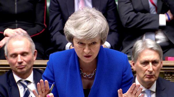 British Prime Minister Theresa May gestures as she speaks during a no confidence debate after Parliament rejected her Brexit deal, in London, Britain, on Jan. 16, 2019. (Screenshot Video/Reuters)