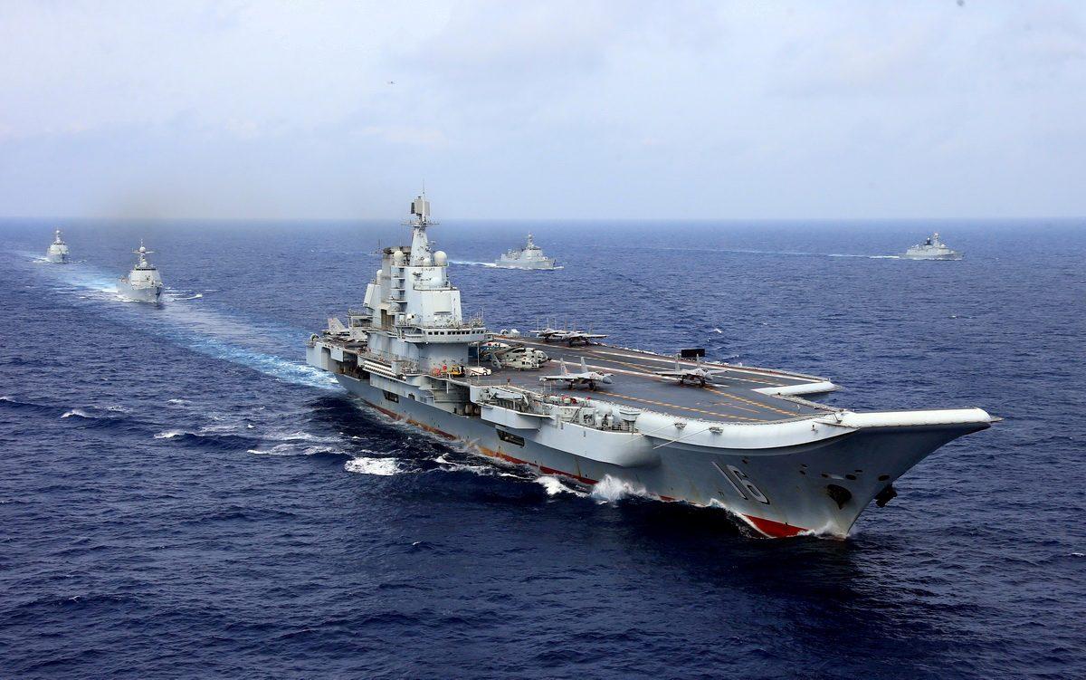 China's aircraft carrier Liaoning takes part in a military drill of the Chinese People's Liberation Army (PLA) Navy in the western Pacific Ocean on April 18, 2018. (Reuters)