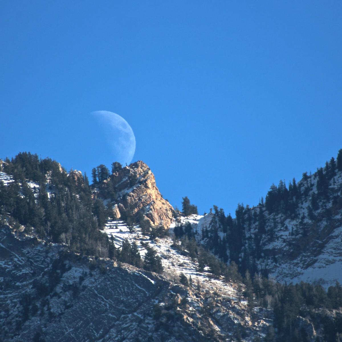 The waxing Moon rises over a ridge in the Wasatch Mountains, Utah on Nov. 14, 2018. (NASA/Bill Dunford)