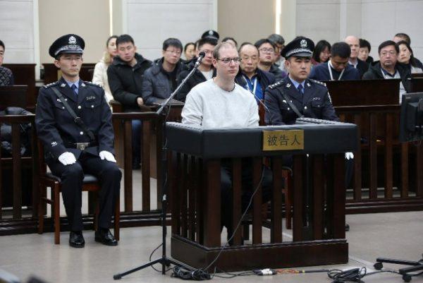 Canadian Robert Schellenberg appears in court for a retrial of his drug smuggling case in Dalian, Liaoning province, China, on Jan. 14, 2019. (Handout via Reuters)
