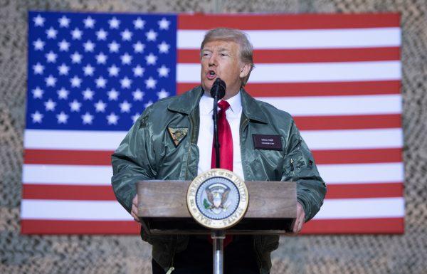 President Donald Trump speaks to members of the U.S. military during an unannounced trip to Al Asad Air Base in Iraq on Dec. 26, 2018. (Saul Loeb/AFP/Getty Images)