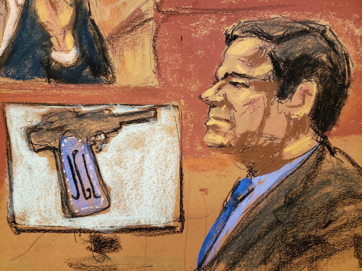 Accused Mexican drug lord Joaquin "El Chapo" Guzman is seen with a handgun on display during a testimony by Drug Enforcement Agency (DEA) agent Victor Vazquez (not shown) in this courtroom sketch in Brooklyn federal court in New York City on Jan. 17, 2019. (Jane Rosenberg/Reuters)