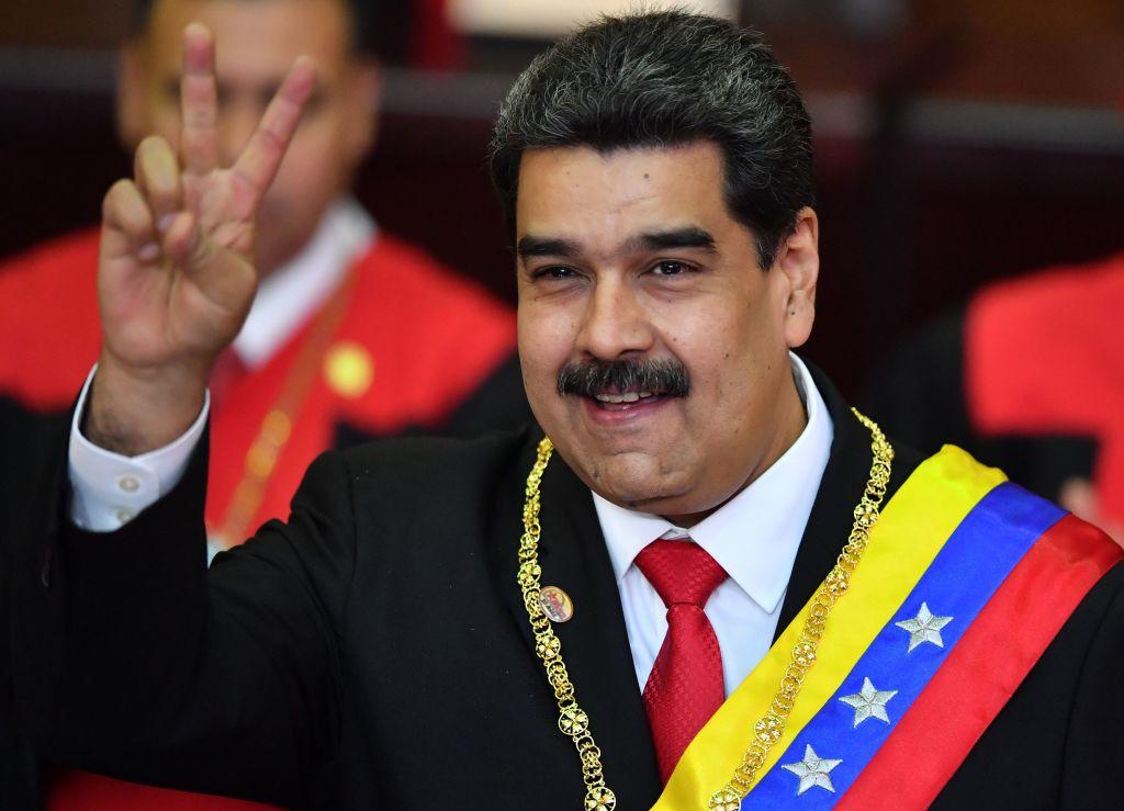 Venezuela's President Nicolas Maduro flashes the victory sign after being sworn-in for his second mandate, at the Supreme Court of Justice (TSJ) in Caracas on Jan. 10, 2019. (Yuri Cortez/AFP/Getty Images)