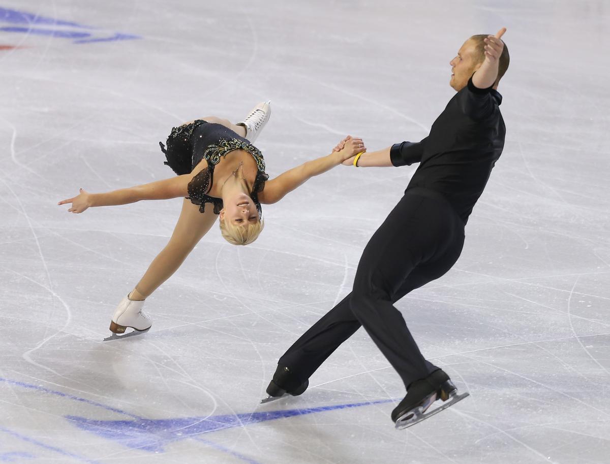 Caydee Denney and John Coughlin skate in the pairs short program during the Skate America competition at the ShoWare Center on October 19, 2012 in Kent, Washington. (Greule Jr/Getty Images)