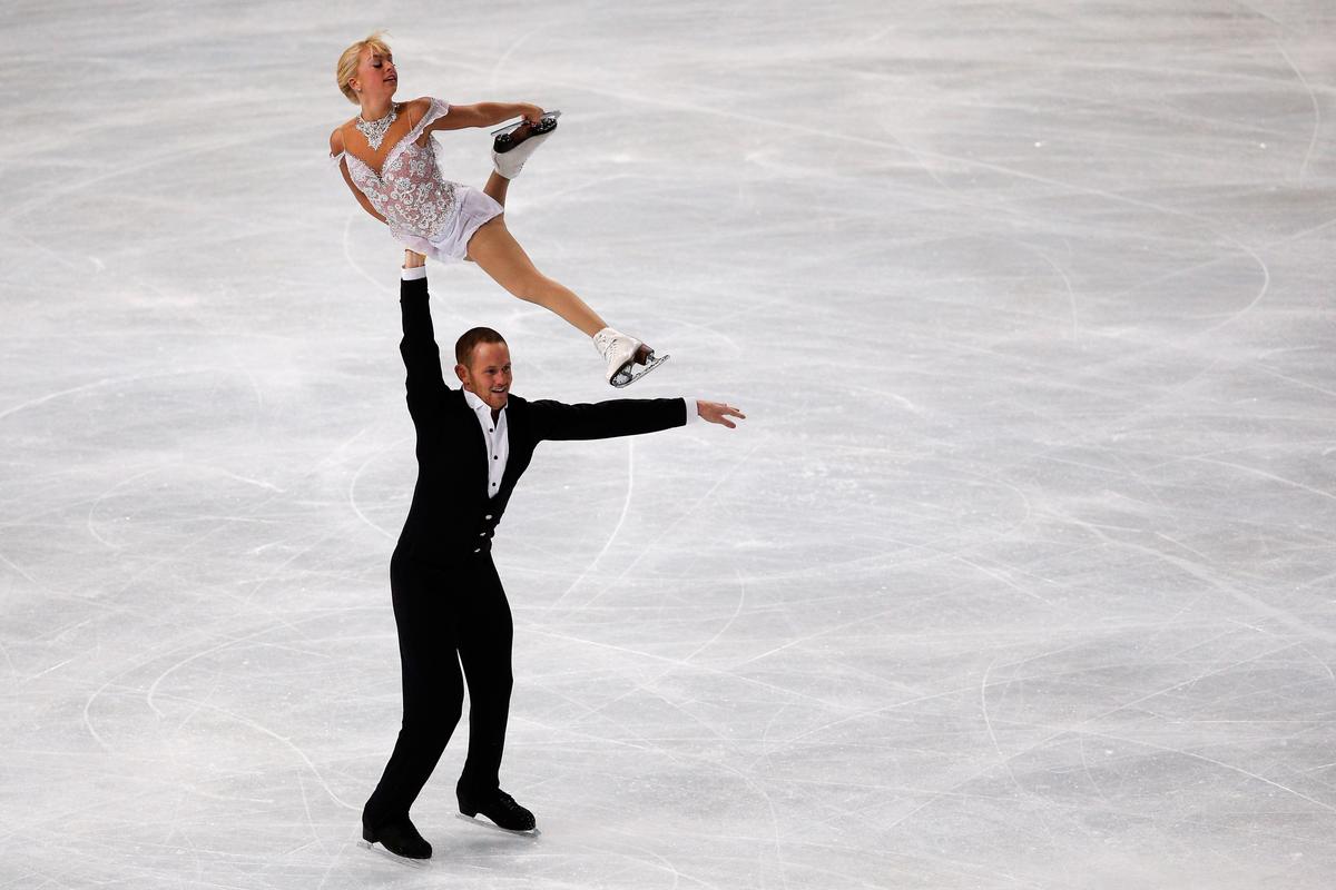 Caydee Denney and John Coughlin of the USA perform in the Paris Free Skating during day two of Trophee Eric Bompard ISU Grand Prix of Figure Skating 2013/2014 at the Palais Omnisports de Bercy in Paris, France on Nov. 16, 2013. (Dean Mouhtaropoulos/Getty Images)