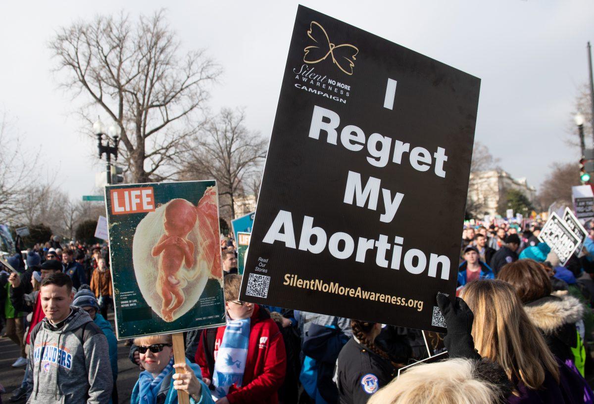 Anti-abortion activists participate in the 'March for Life,' an annual event to mark the anniversary of the 1973 Supreme Court case Roe v. Wade, which legalized abortion in the United States, outside the U.S. Supreme Court in Washington, on Jan. 18, 2019. (Saul Loeb/AFP/Getty Images)