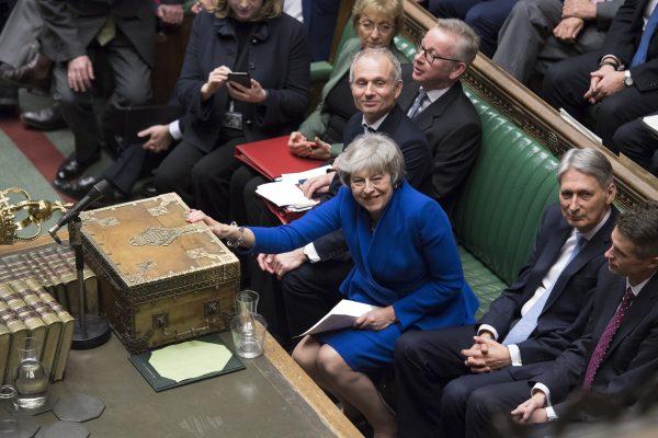 Britain's Prime Minister Theresa May reacts after she won a no-confidence vote against her government, in the House of Commons, London, on Jan. 16, 2019. (Jessica Taylor/UK Parliament/AP)