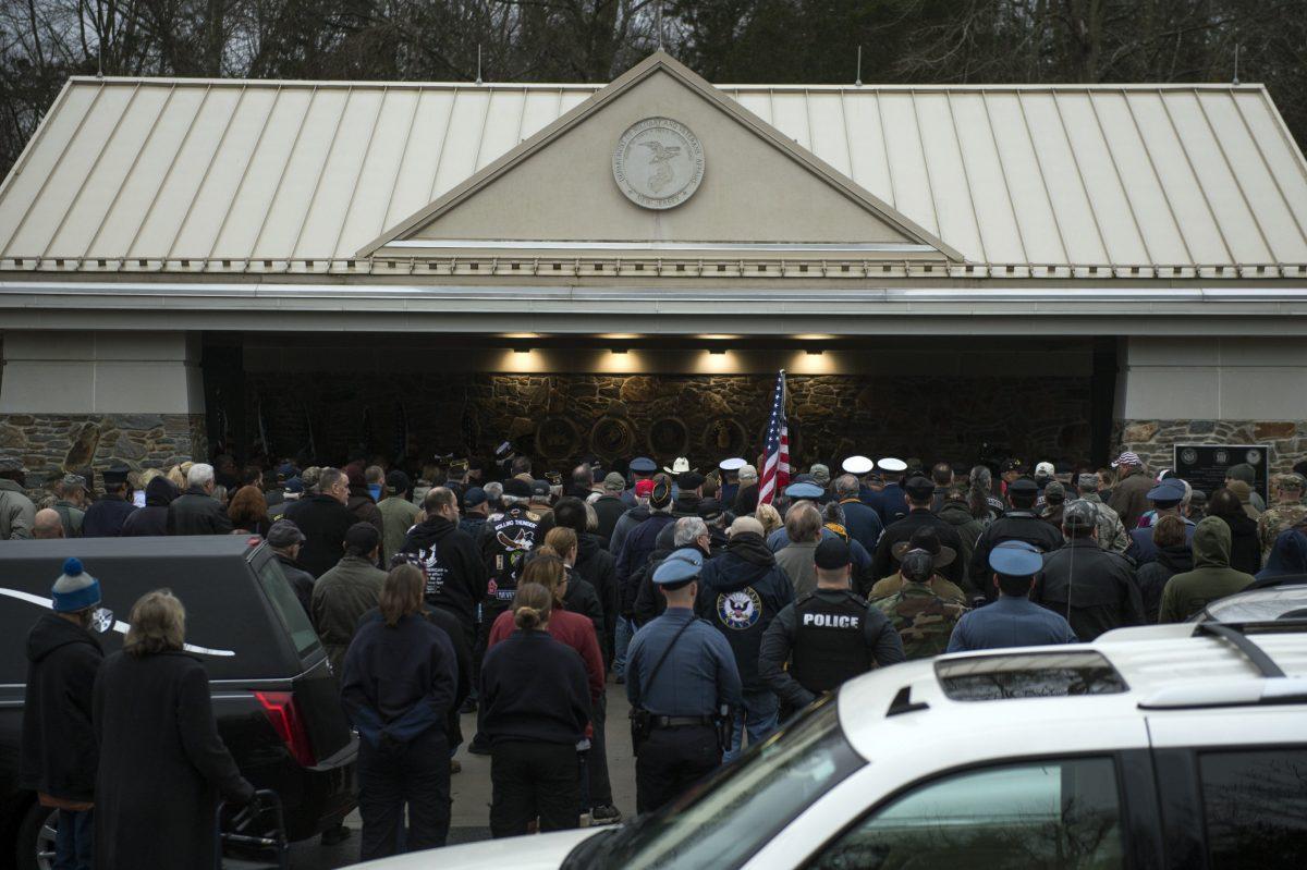 Hundreds of strangers gather as a funeral for Vietnam veteran Peter Purnpu is held in Wrightstown, New Jersey, on Jan. 18, 2019. (Joe Lamberti/Camden Courier-Post via AP)