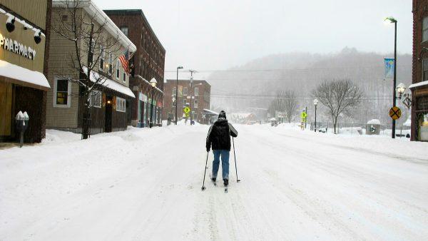 Bill Moore cross-country skis down a street in Montpelier, Vt., on Jan. 20, 2019. (Lisa Rathke/AP)