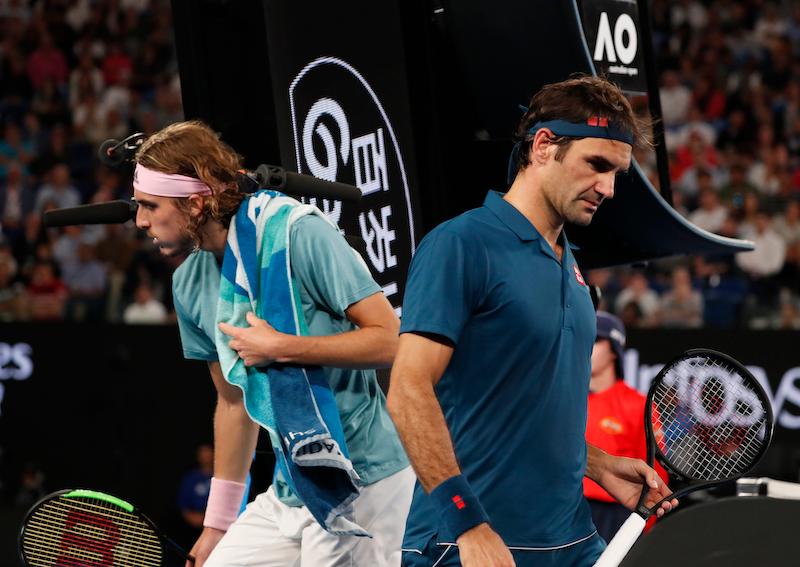 Switzerland’s Roger Federer and Greece’s Stefanos Tsitsipas during the match at the Australian Open in Melbourne, on Jan. 20, 2019. (Reuters/Aly Song)
