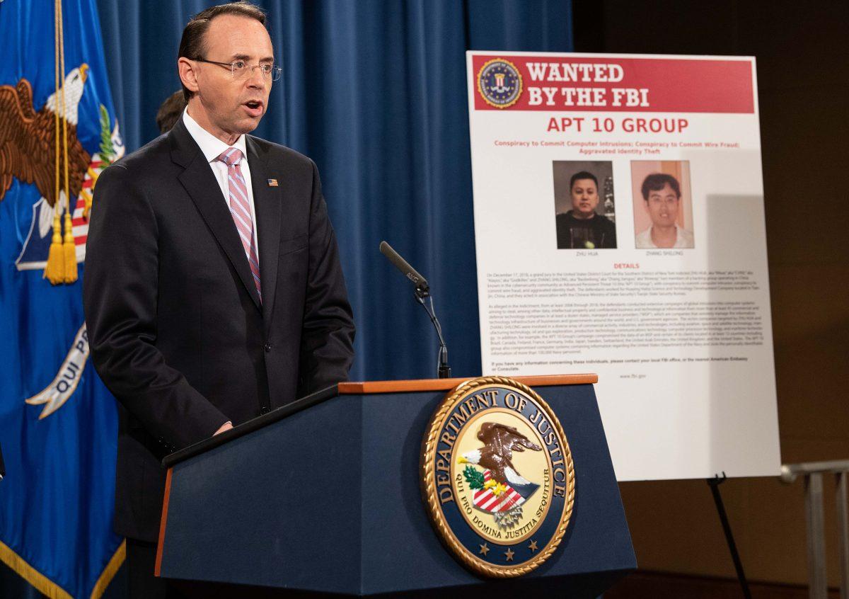 Deputy Attorney General Rod Rosenstein speaks at a press conference about Chinese hacking at the Justice Department in Washington on Dec. 20, 2018. (Nicholas Kamm/AFP/Getty Images)
