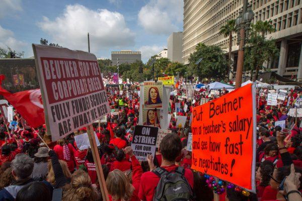 Striking teachers and supporters rally outside City Hall as negotiations resume on Jan. 18, 2019, in Los Angeles. (David McNew/Getty Images)