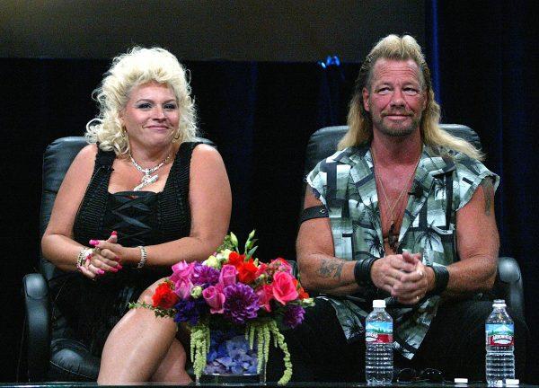 Bounty Hunter Dog Chapman (R) and his wife Beth Chapman of "Dog The Bounty Hunter" speaks with the press at the TCA Press Tour Cable at the Century Plaza Hotel in Los Angeles on July 21, 2004. (Frederick M. Brown/Getty Images)