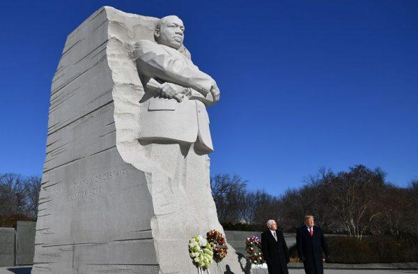 US President Donald Trump and US Vice President Mike Pence(L) visit the Martin Luther King Jr. Memorial in Washington, DC on Martin Luther King Day on Jan. 21, 2019. (MANDEL NGAN/AFP/Getty Images)