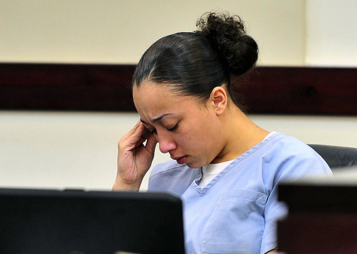 In this Nov. 13, 2012, photo, Cyntoia Brown reacts during a hearing in Nashville. (Jae S. Lee/The Tennessean via AP)