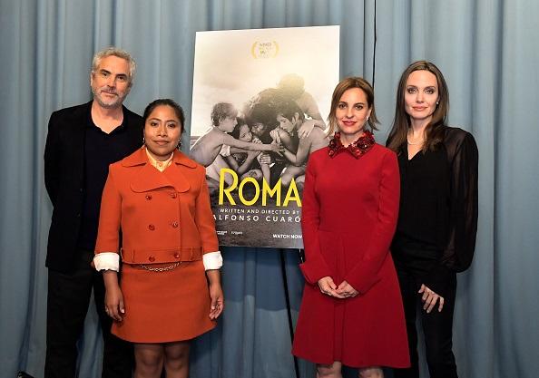 Alfonso Cuarón, Yalitza Aparicio, Angelina Jolie, and Marina De Tavira attend the "ROMA" Tastemakers Screening and Reception at San Vicente Bungalows in West Hollywood, Calif., on Jan. 5, 2019. (Charley Gallay/Getty Images)