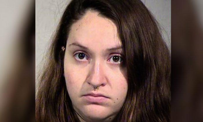 Mom Arrested After Dead Baby Found in Amazon Site’s Restroom