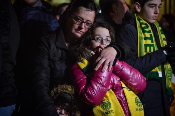 FC Nantes football club supporters gather after it was announced that the plane Argentine forward Emiliano Sala was flying in vanished during a flight from Nantes in western France to Cardiff in Wales on Jan. 22, 2019. (Loic Venance/AFP/Getty Images)